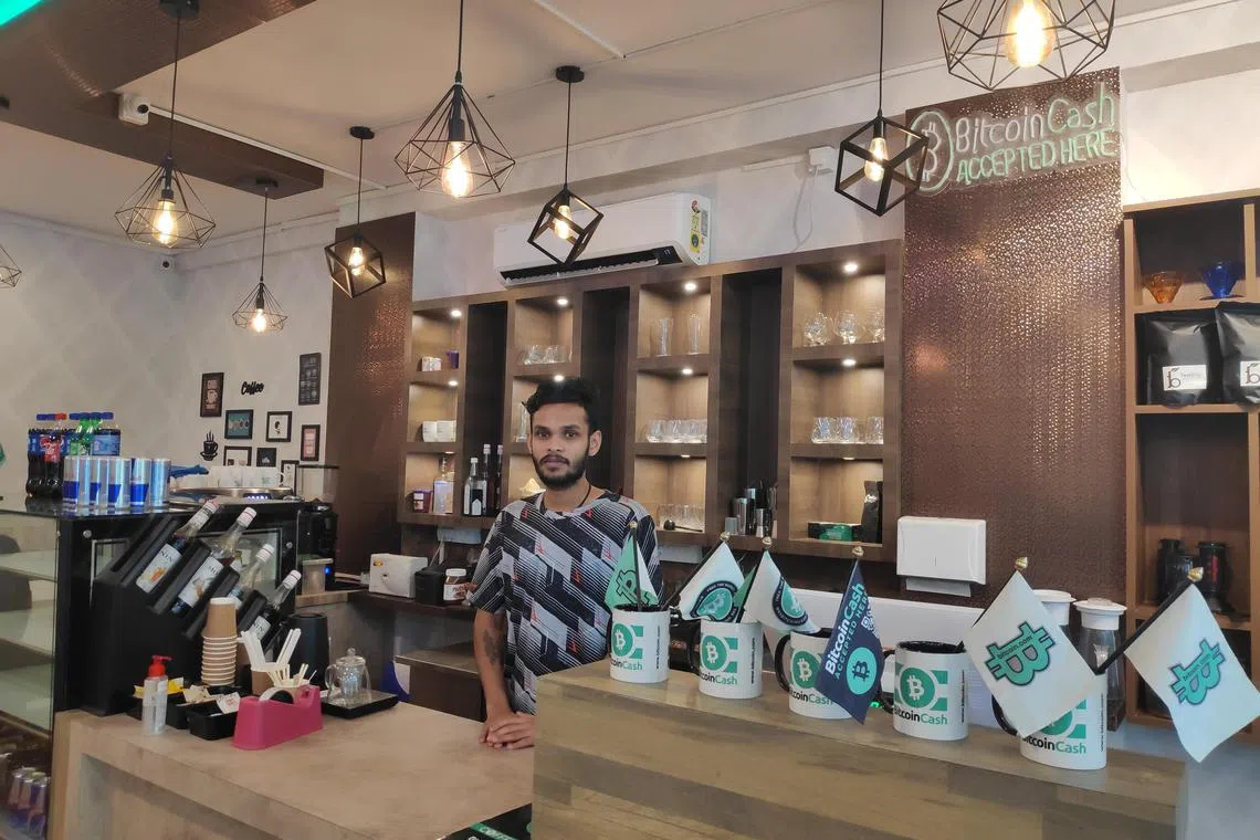 rmcrypto - Augusteen Sanoobh, 22, who manages a Bengaluru cafe that accepts cryptocurrency payments, says newbie investors like him fear that the global crypto meltdown will wipe out their holdings

 credit: Rohini Mohan