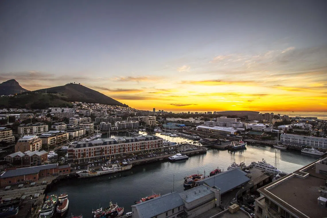 The V&A Waterfront in Cape Town, South Africa, with the five-star Cape Grace hotel (in the centre, with red exterior) in this popular area filled with restaurants, hotels and shops. 


