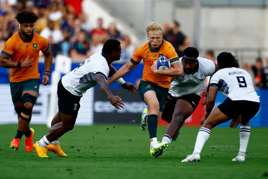 Rugby Union - Rugby World Cup 2023 - Pool C - Australia v Fiji - Stade Geoffroy-Guichard, Saint-Etienne, France - September 17, 2023  Australia's Carter Gordon in action REUTERS/Sarah Meyssonnier