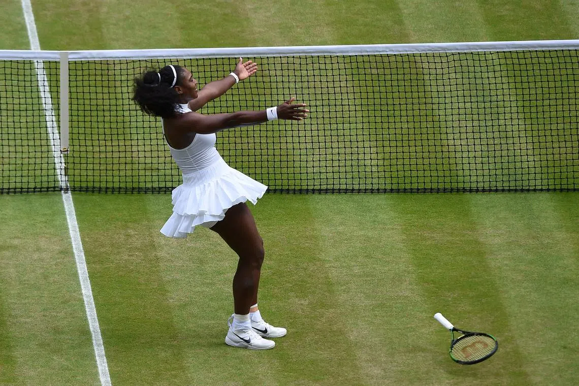 Serena Williams celebrates winning a match against Germany's Angelique Kerber at WImbledon.