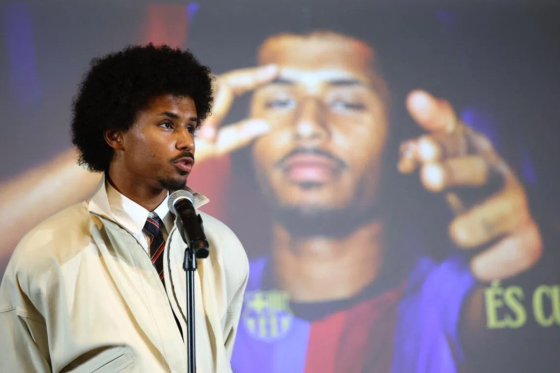 Soccer Football - FC Barcelona unveil new signing Karim Adeyemi - Spotify Camp Nou, Barcelona, Spain - July 23, 2026 Karim Adeyemi speaks after signing for FC Barcelona REUTERS/Albert Gea