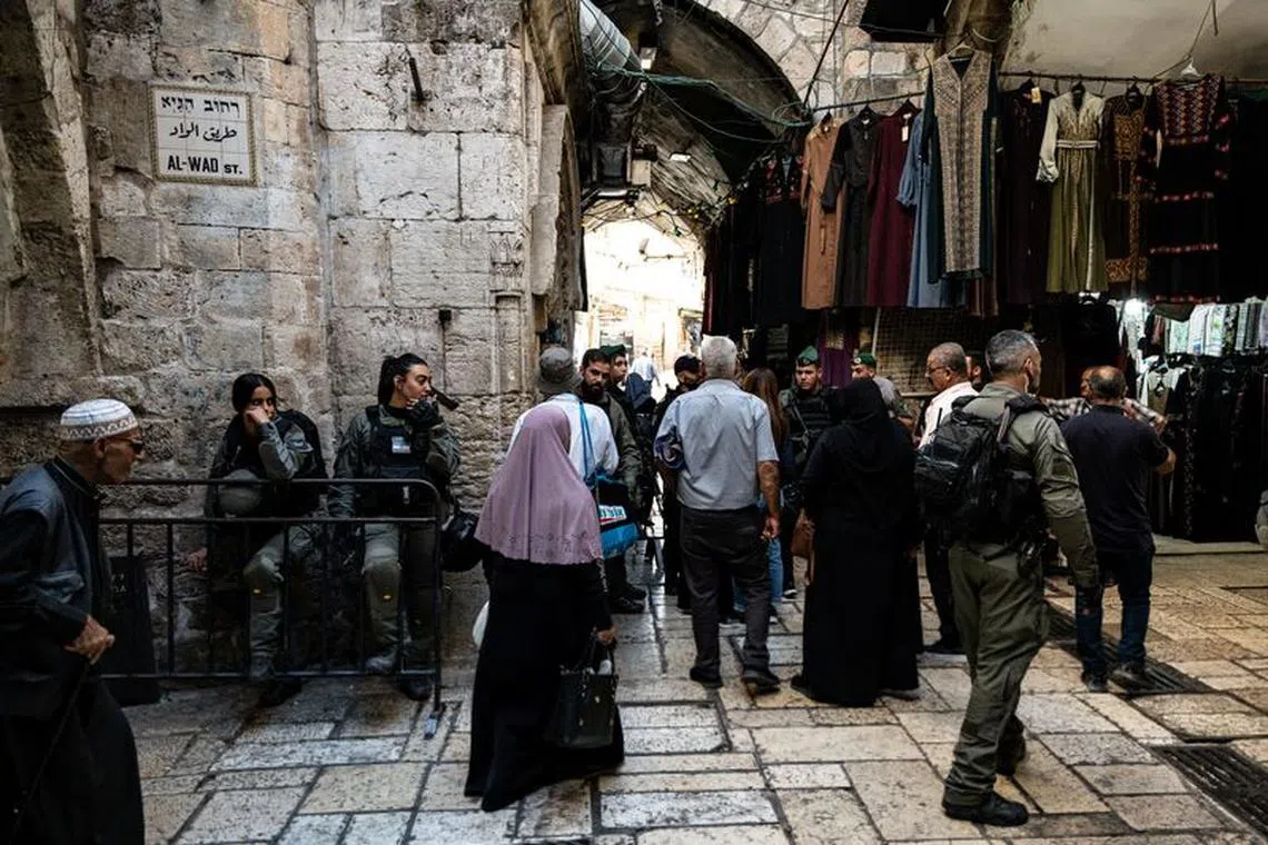 Israeli Border Police check Palestinians before Friday prayers inside Jerusalem's Old City, November 10, 2023. REUTERS/Latifeh Abdellatif