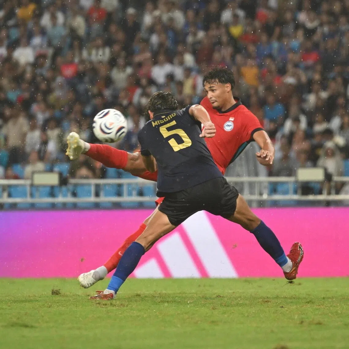 Singapore’s Ilhan Fandi scoring the late winner against Cambodia with a spectacular scissors-kick at the Morodok Techo National Stadium in Phnom Penh on July 24.