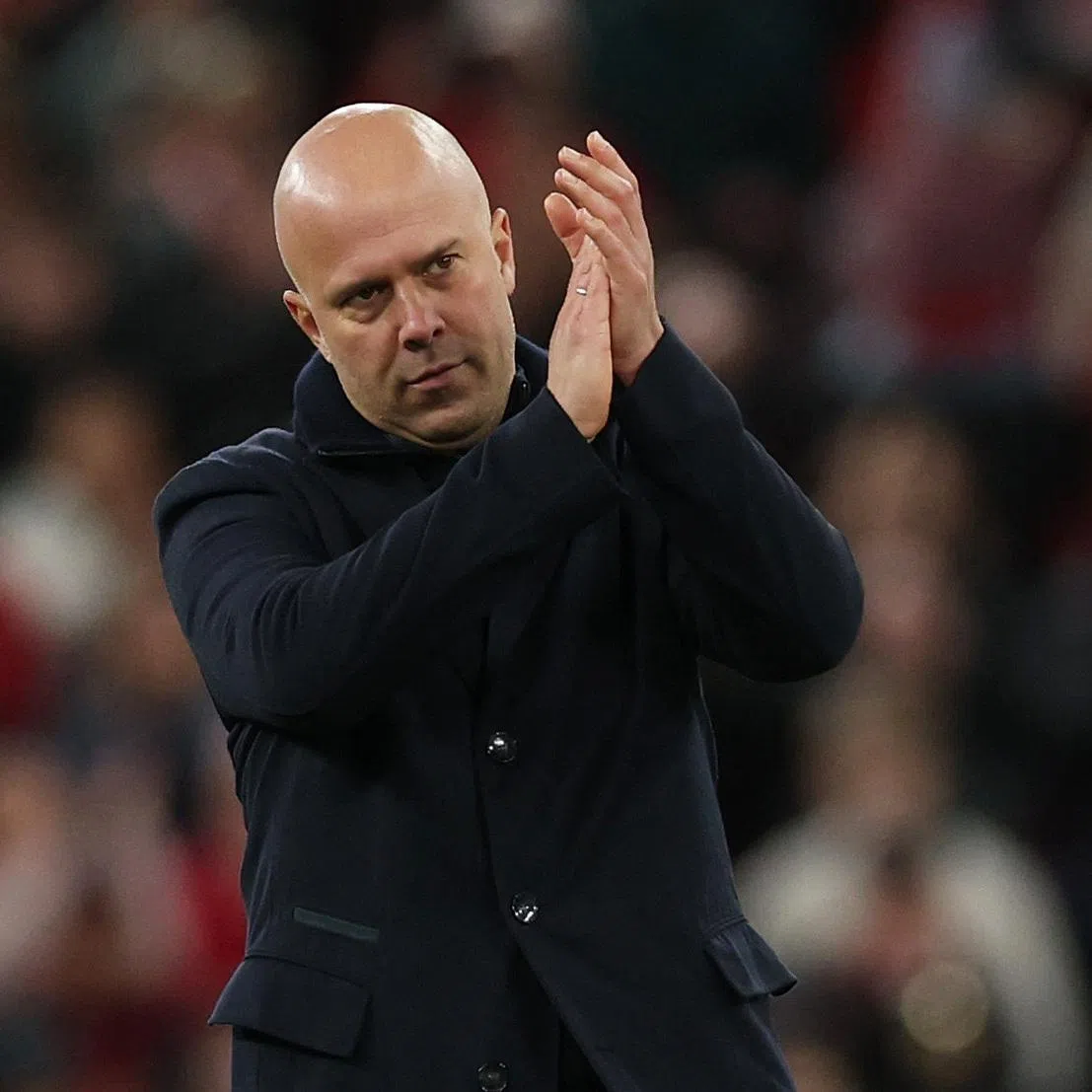 Soccer Football - Premier League - Liverpool v Brighton & Hove Albion - Anfield, Liverpool, Britain - December 13, 2025 Liverpool manager Arne Slot celebrates after the match REUTERS/Phil Noble