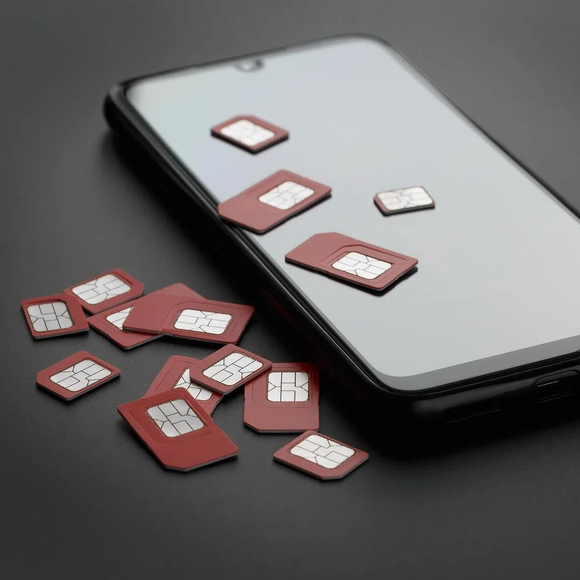 Large quantities of computer equipment, mobile phones, laptops, and SIM cards were seized by the authorities.