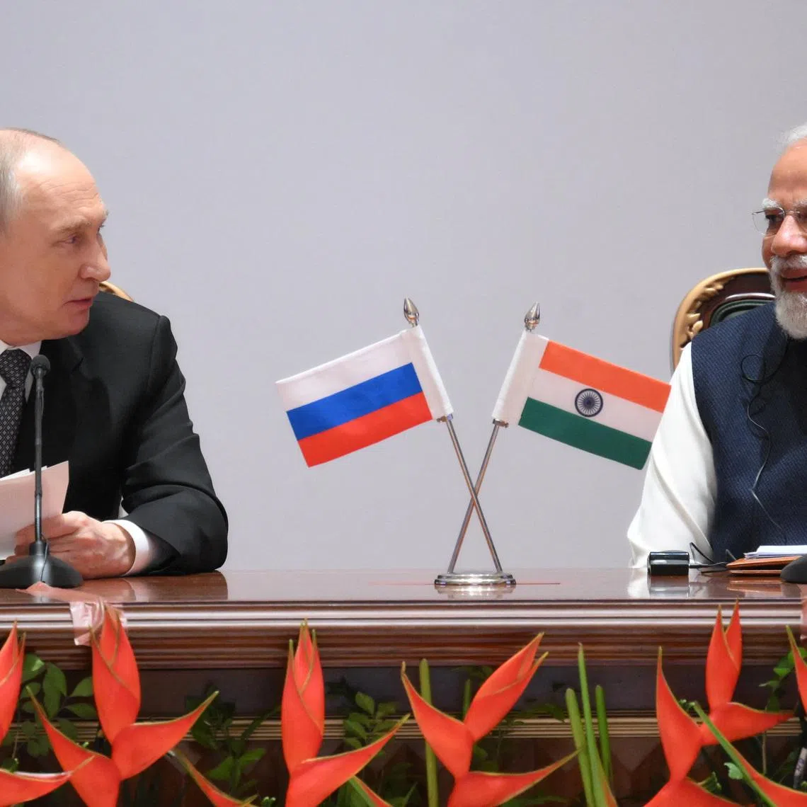 Russia's President Vladimir Putin and India's Prime Minister Narendra Modi attend the India-Russia Business Forum in New Delhi, India, December 5, 2025. Sputnik/Grigory Sysoyev/Pool via REUTERS ATTENTION EDITORS - THIS IMAGE WAS PROVIDED BY A THIRD PARTY.