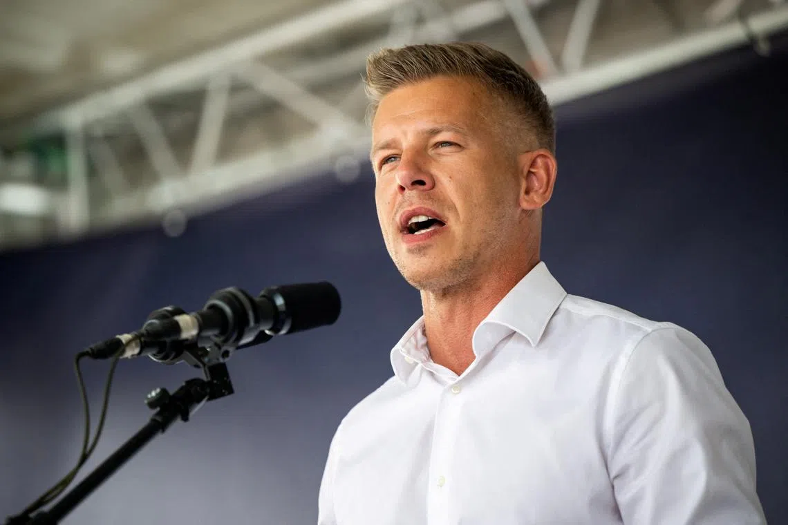 FILE PHOTO: Peter Magyar, leader of Hungary's main opposition Tisza party, delivers a speech at a party rally in Szekesfehervar, Hungary, July 26, 2025. REUTERS/Marton Monus/File Photo