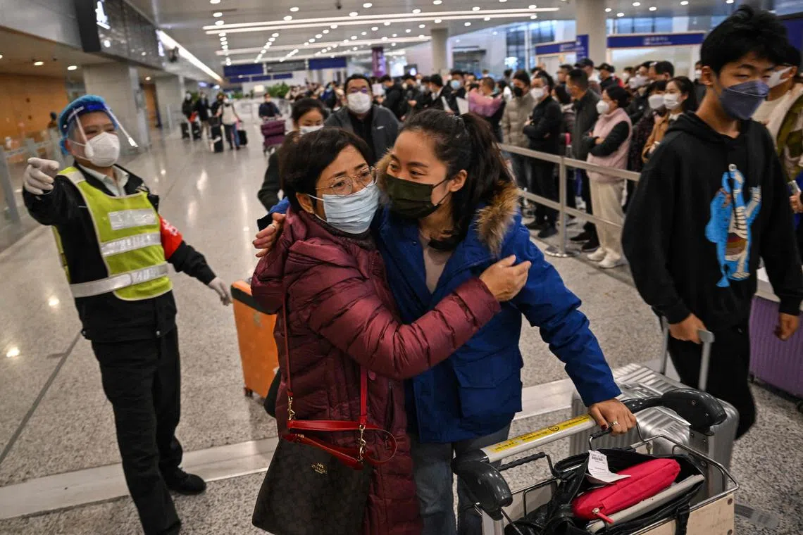 A passenger receiving a hug at the international arrival area in Shanghai Pudong International Airport on Jan 8, 2023.