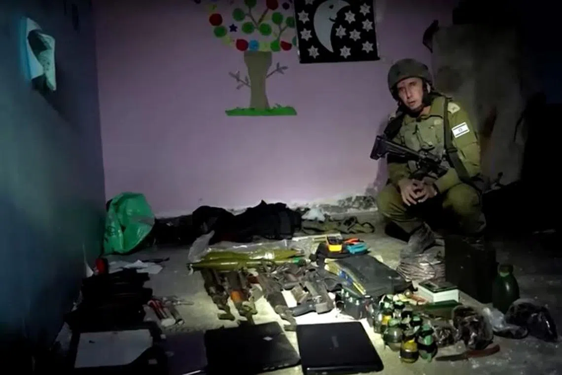 The Israeli military shared video and photographs on Monday showing what it said were weapons stored by Hamas in the basement of a children's hospital in Gaza where it also said hostages appear to have been held. via IDF