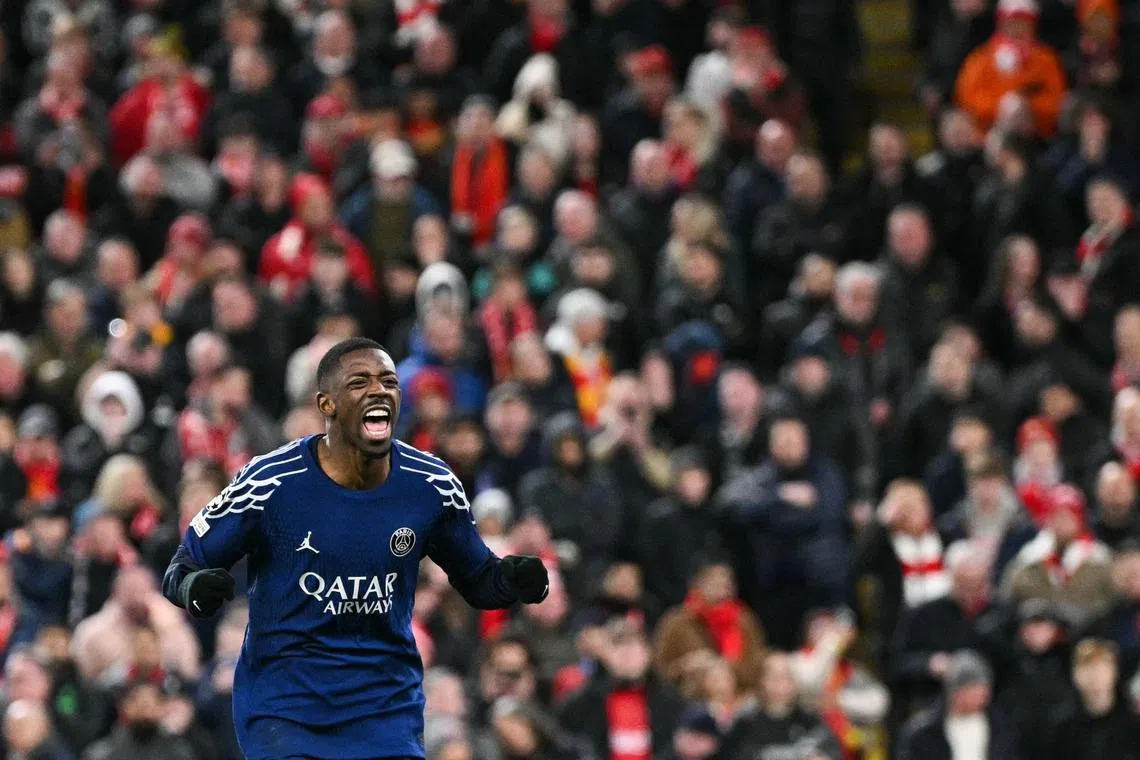 Paris Saint-Germain's Ousmane Dembele celebrates scoring the winning penalty.