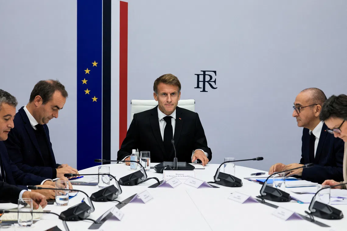 French President Emmanuel Macron said Interior Minister Laurent Nunez (second from right) should stay to ensure a chain of command is retained within the police and security forces.