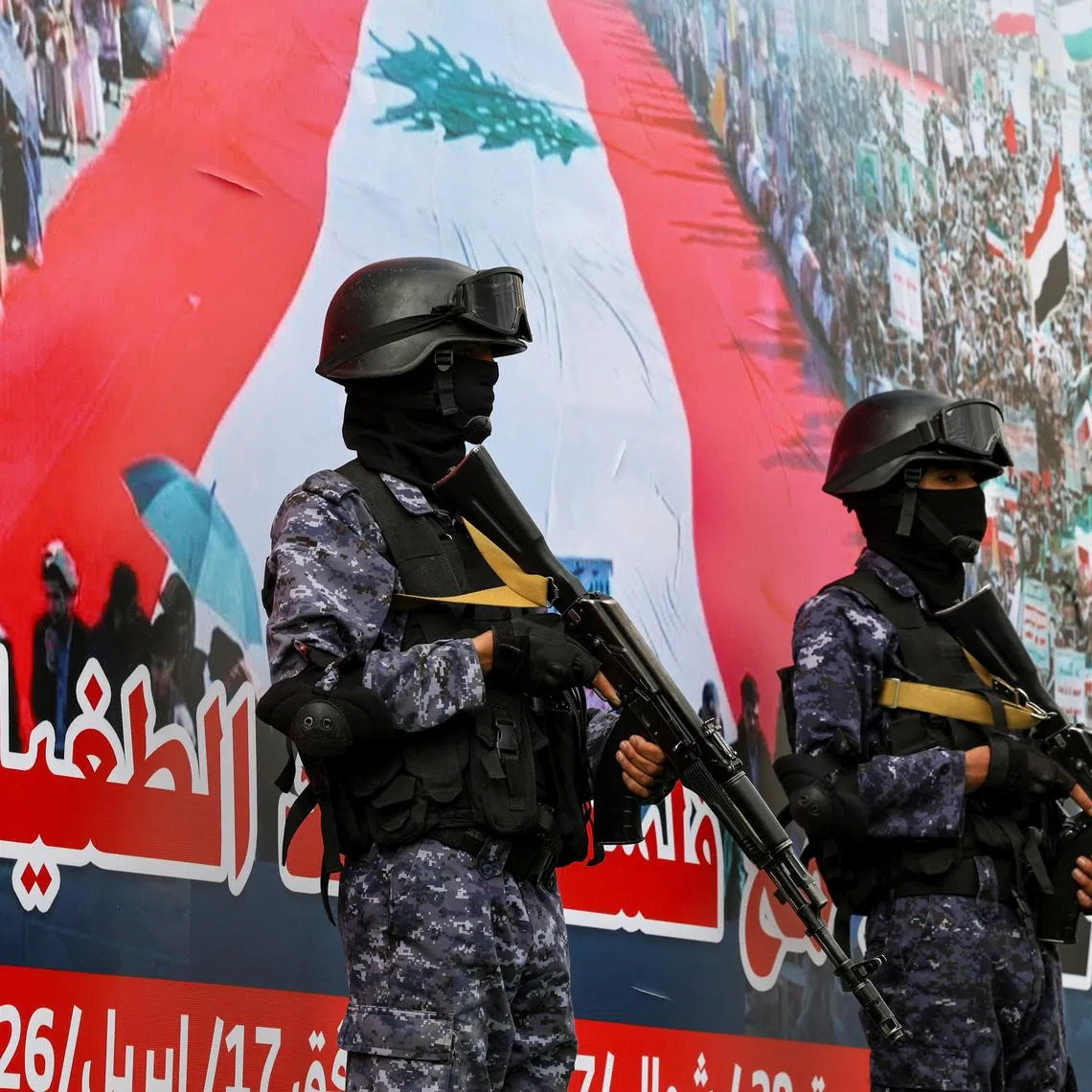 FILE PHOTO: Houthi security personnel stand guard during a demonstration in Sanaa, Yemen, April 17, 2026. REUTERS/Khaled Abdullah/File Photo