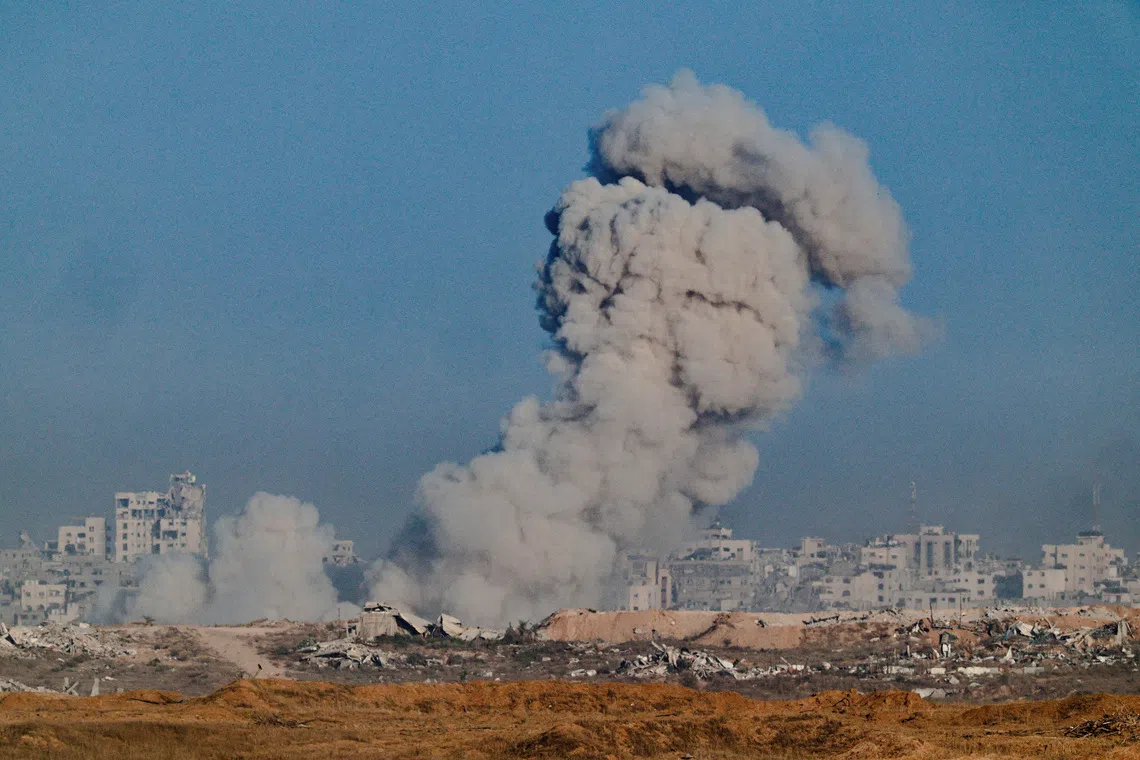 Smoke rises from Gaza after an explosion, as seen from Israel September 17, 2025. REUTERS/Amir Cohen