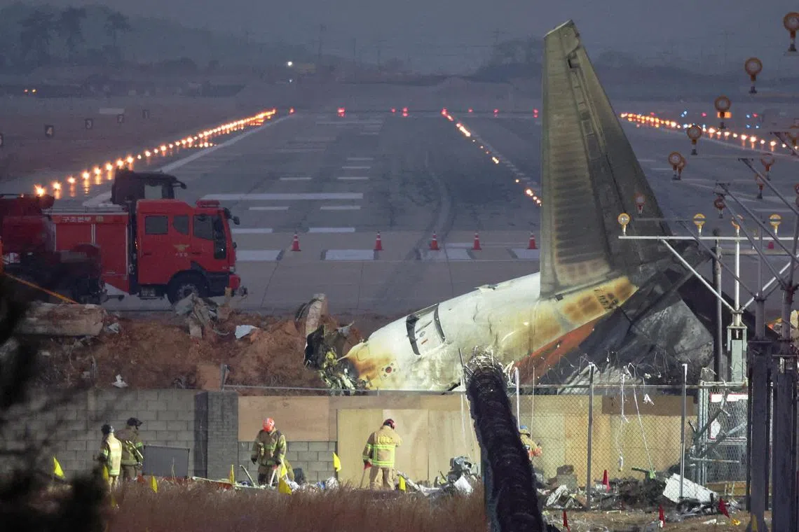 Rescue work takes place near the wreckage of the Jeju Air aircraft at Muan International Airport in South Korea, on Dec 30.