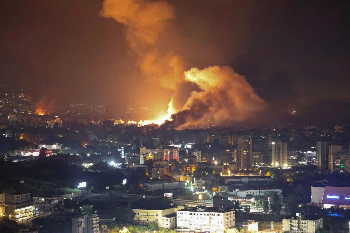 Smoke billows following Israeli strikes over Beirut's southern suburbs, amid ongoing hostilities between Hezbollah and Israeli forces, as seen from Sin El Fil, Lebanon, September 28, 2024. REUTERS/Mohamed Azakir