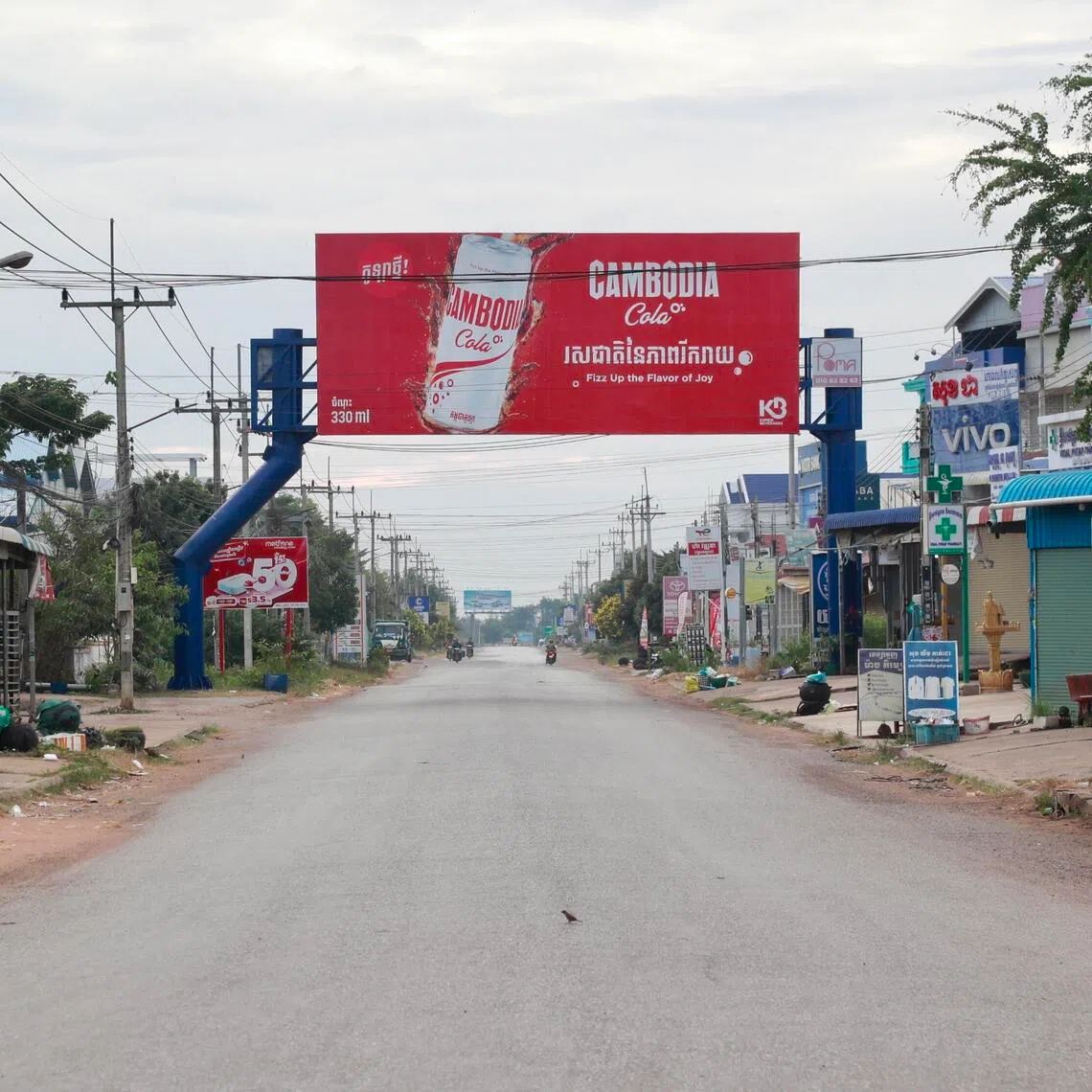 Closed shops line an empty street in a border town in Oddar Meanchey province, Cambodia, following fresh clashes between Thai and Cambodian troops.