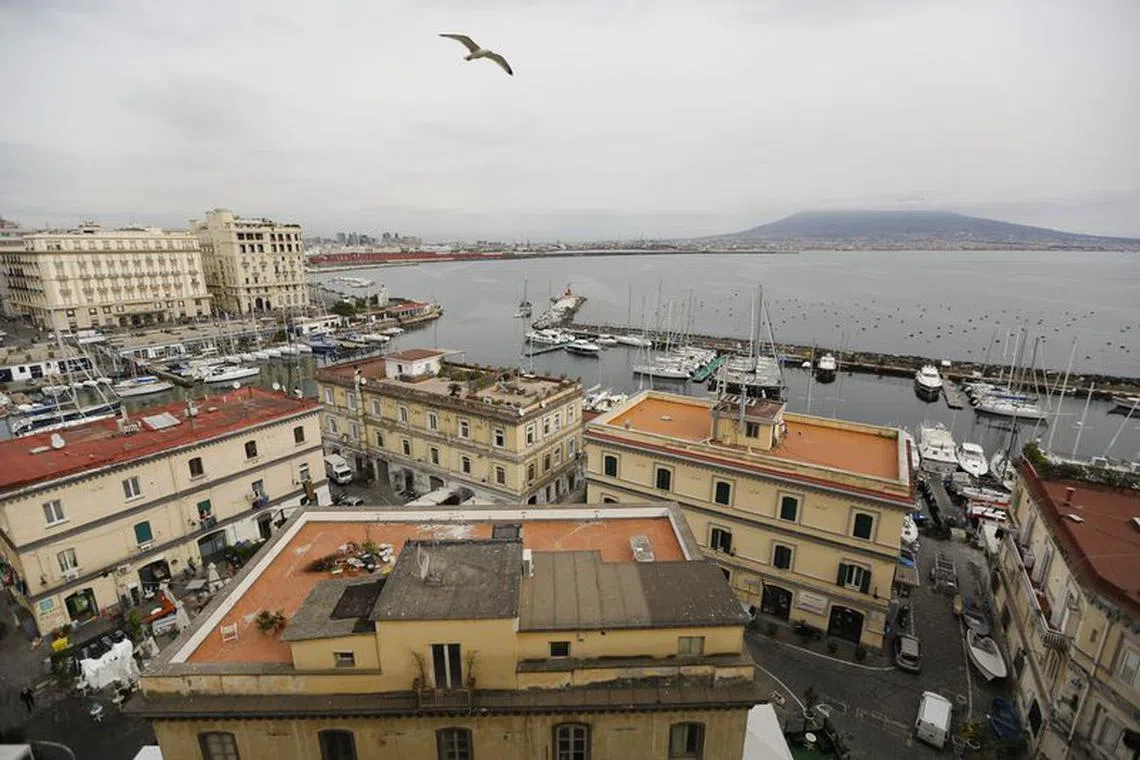 FILE PHOTO: A general view of Naples gulf and Vesuvio volcano, Italy February 22, 2016. REUTERS/Tony Gentile