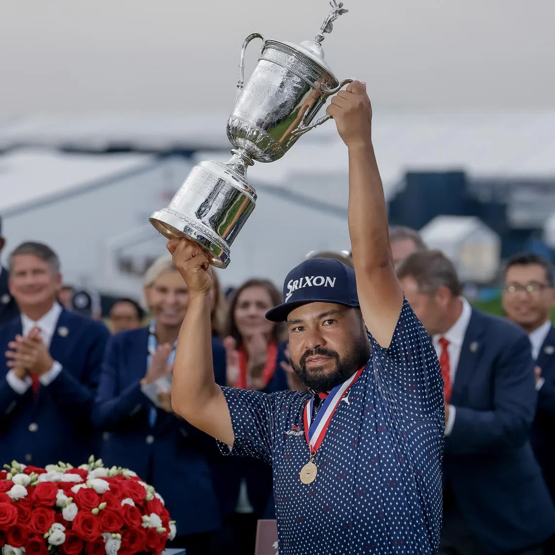 J.J. Spaun holds the USGA trophy after winning 2025 US Open golf tournament on June 15.