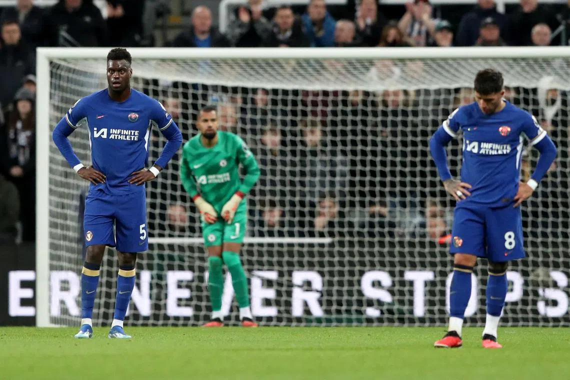 Chelsea's Benoit Badiashile looks dejected after Newcastle United's fourth goal.