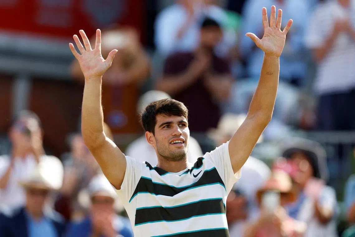 Spain's Carlos Alcaraz celebrates after winning his round of 32 match against Australia's Adam Walton.