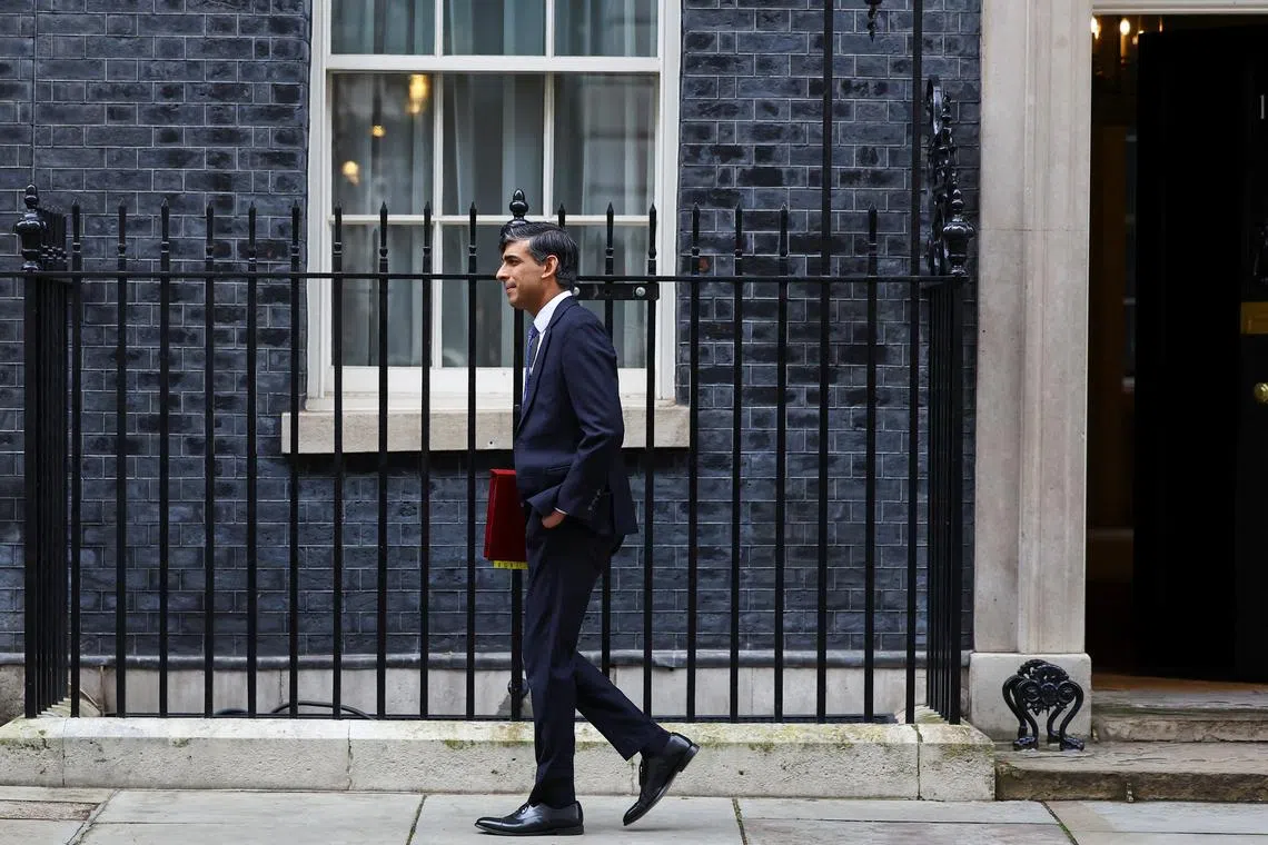 FILE PHOTO: British Prime Minister Rishi Sunak leaves Downing Street in London, Britain, March 13, 2024. REUTERS/Hannah McKay/FILE PHOTO