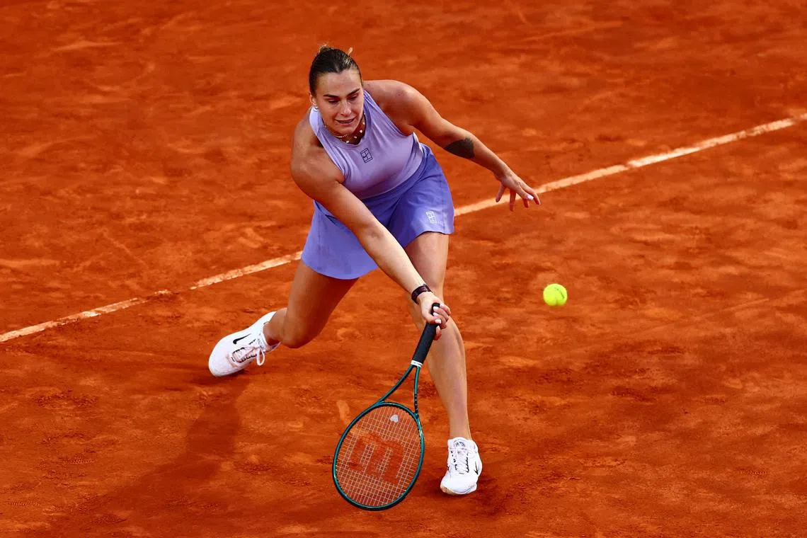 FILE PHOTO: Tennis - Italian Open - Foro Italico, Rome, Italy - May 14, 2025 Belarus' Aryna Sabalenka in action during her quarter final match against China's Zheng Qinwen REUTERS/Yves Herman/File Photo