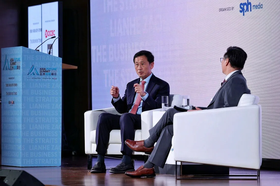 Coordinating Minister for Social Policies and Minister for Health Ong Ye Kung speaking at a dialogue moderated by Lianhe Zaobao editor Goh Sin Teck during the Asia Future Summit on Oct 9.
