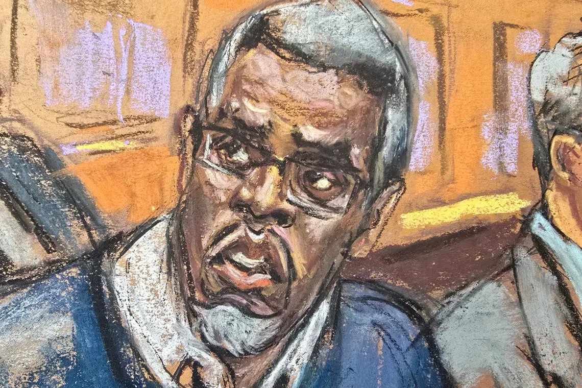 Sean \"Diddy\" Combs sits at the defense table as he listens to lawyer Marc Agnifilo speak during his sex trafficking trial in New York City, New York, U.S., May 9, 2025 in this courtroom sketch. REUTERS/Jane Rosenberg/File Photo