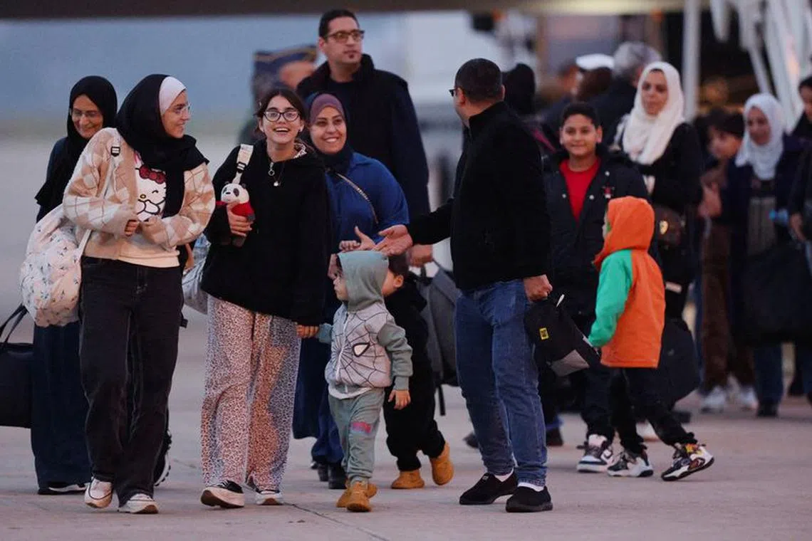 Spanish-Palestinians and Palestinians evacuated from Gaza arrive at the Torrejon de Ardoz Air Force Base outside Madrid, Spain November 16, 2023. REUTERS/Violeta Santos Moura