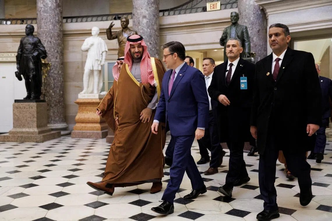 Saudi Crown Prince Mohammed bin Salman (left) walking alongside US House Speaker Mike Johnson on Capitol Hill in Washington, on Nov 19.