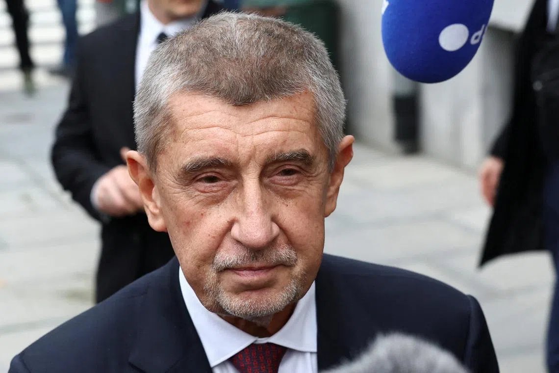 Czech Republic Prime Minister Andrej Babis speaks to the media as he arrives at the Patriots for Europe (PfE) party meeting in Brussels, Belgium, December 17, 2025. REUTERS/Yves Herman