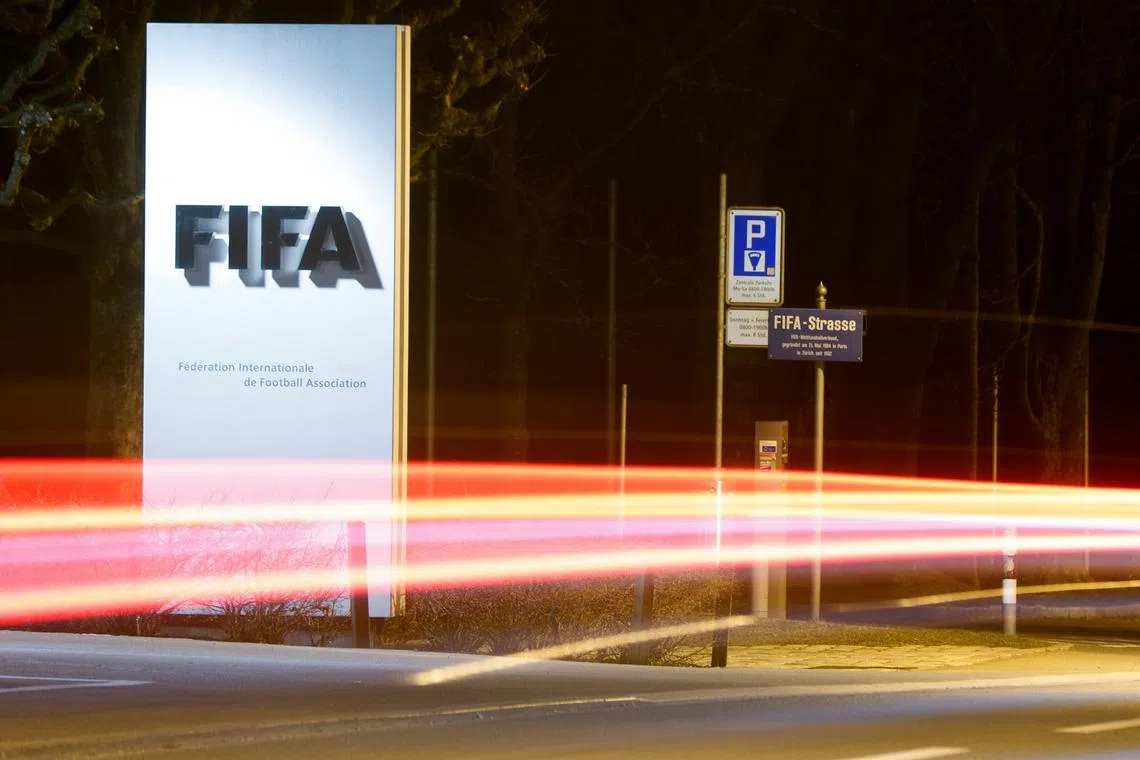 FILE PHOTO: A long exposure shows FIFA's logo near its headquarters in Zurich, Switzerland February 27, 2022. REUTERS/Arnd Wiegmann/File Photo