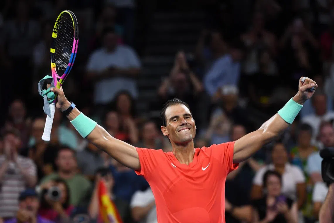 Rafael Nadal celebrates after beating Dominic Thiem in the first round of the Brisbane International.