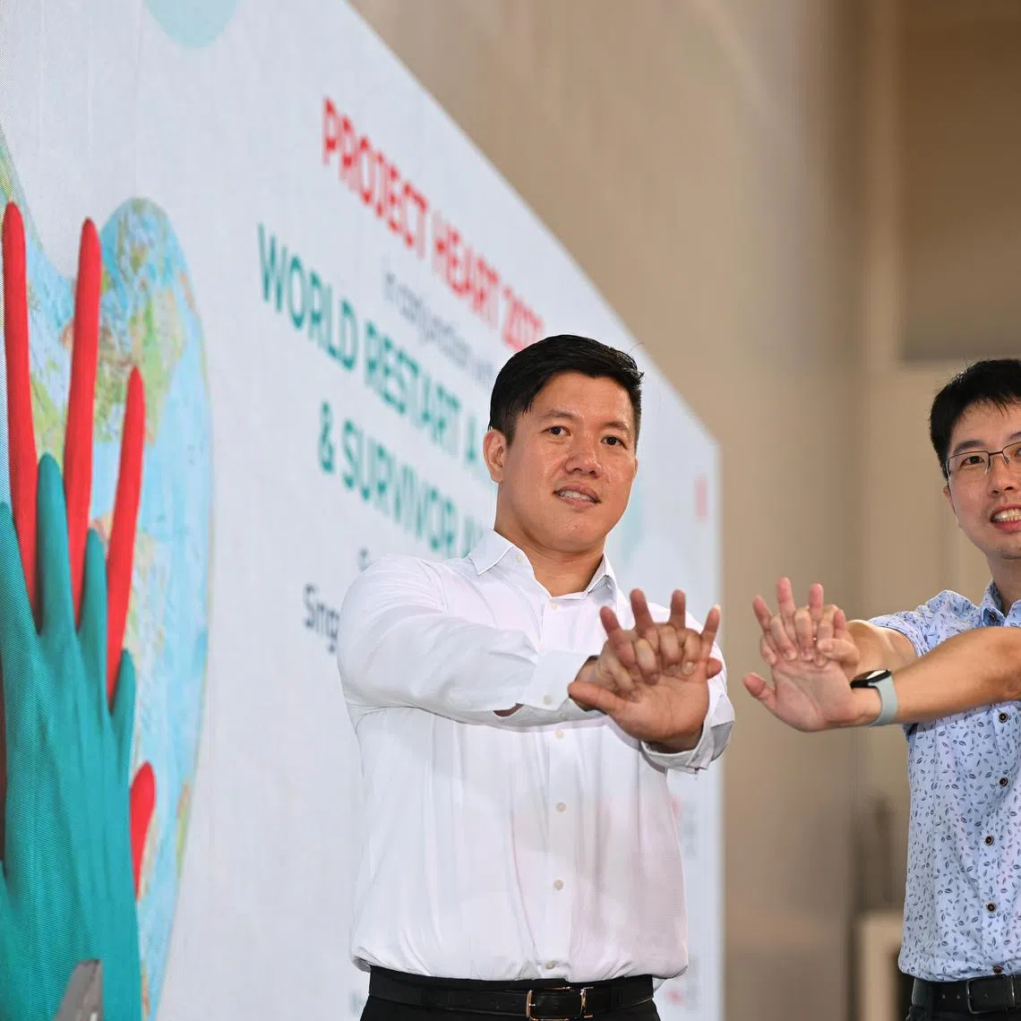 Engineer Lin Guang Min (left) and educator Jeremy Ang were among 34 recipients of the Survivor Awards Singapore 2023 at the Singapore Heart Foundation (SHF)’s Project Heart event.