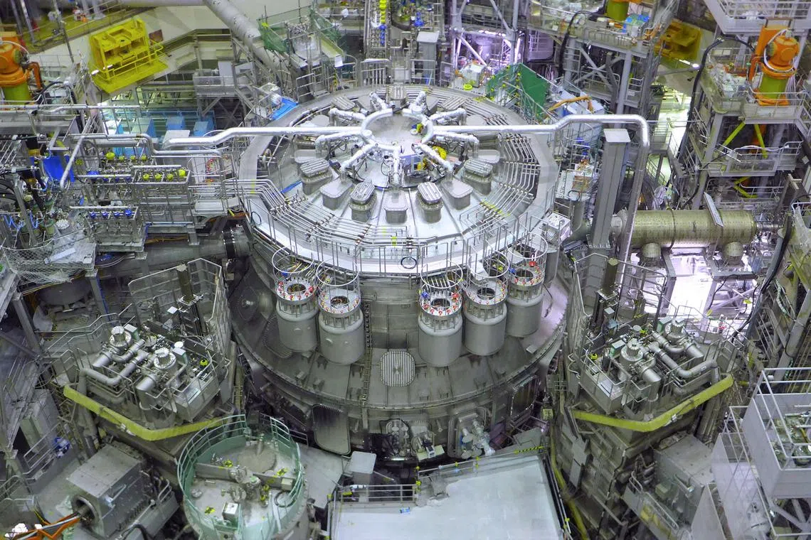 TOPSHOT - This undated handout image taken and received by the National Institutes for Quantum Science and Technology (QST) on December 1, 2023 shows the JT-60SA, the world's biggest nuclear fusion reactor constructed to date, before its planned inauguration in the city of Naka, Ibaraki prefecture on December 1. Harnessing nuclear fusion, the same process which powers the Sun, has been described as potentially humanity's best energy source for the future but the technology is in its infancy. (Photo by Handout / National Institutes for Quantum Science and Technology (QST) / AFP) / -----EDITORS NOTE --- RESTRICTED TO EDITORIAL USE - MANDATORY CREDIT "AFP PHOTO / National Institutes for Quantum Science and Technology (QST)" - NO MARKETING - NO ADVERTISING CAMPAIGNS - DISTRIBUTED AS A SERVICE TO CLIENTS