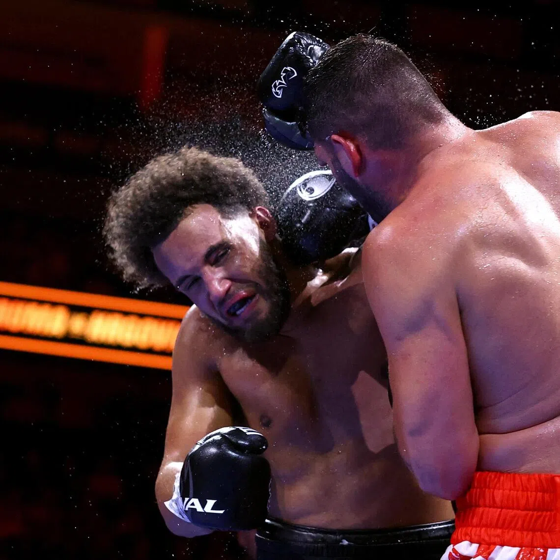 Britain’s Moses Itauma reeling from a punch by Croatia’s Filip Hrgovic in their IBF world heavyweight title bout at London’s O2 Arena on Aug 29.