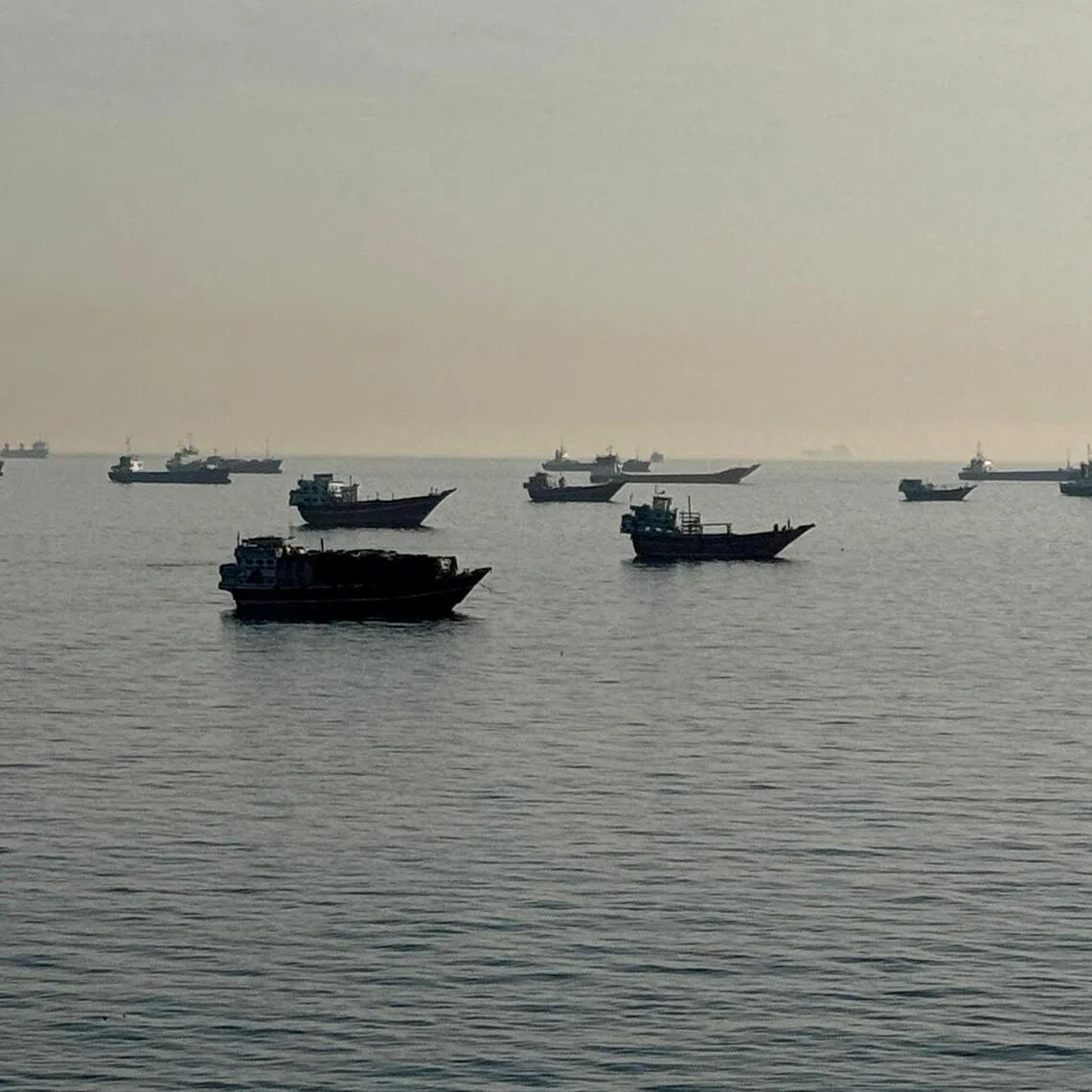 Vessels are seen anchored in the Strait of Hormuz, off the port city of Khasab on Oman’s northern Musandam Peninsula on May 17.