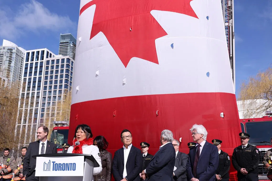 Toronto Mayor Olivia Chow speaks to reporters at a news conference outside a fire station in Toronto, Ontario, Canada. 