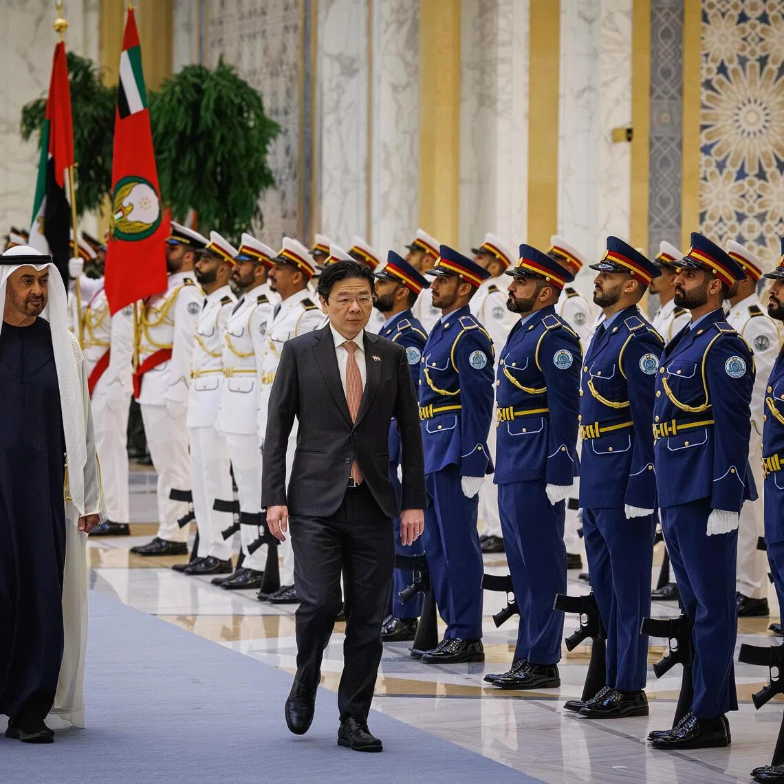 Prime Minister Lawrence Wong was welcomed with a ceremony at the Qasr Al Watan in Abu Dhabi, where United Arab Emirates President Sheikh Mohamed bin Zayed Al Nahyan received him on Oct 21.