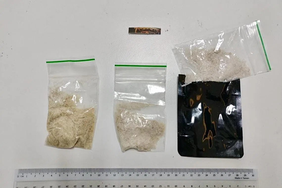 The packets of substances suspected to contain drugs were concealed in black packaging. 