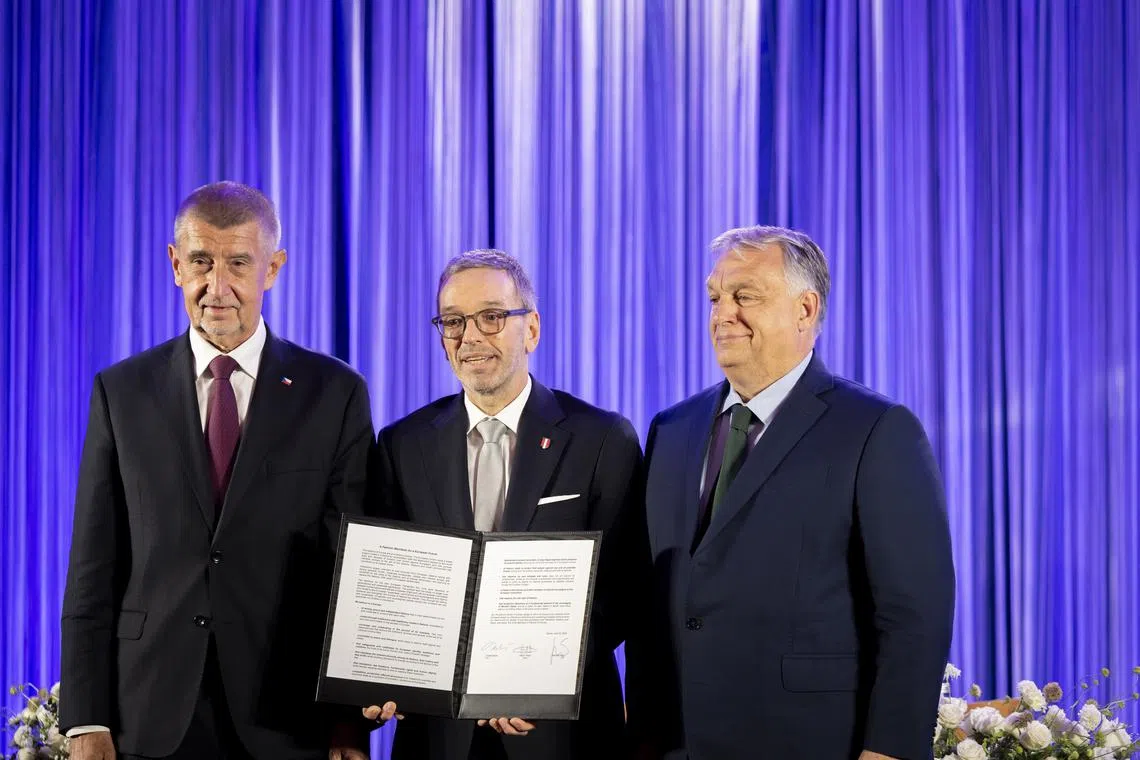 (From left) Andrej Babis, leader of the ANO party; Herbert Kickl, head of the Austrian Freedom Party and Hungarian Prime Minister Viktor Orban, leader of the ruling Fidesz party, pose after signing the agreement.