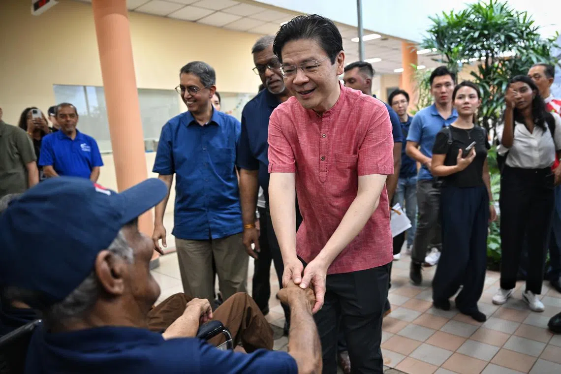 PM Lawrence Wong visiting the Sree Narayana Mission in Yishun on March 2 for a Buka Puasa and relief packing event.