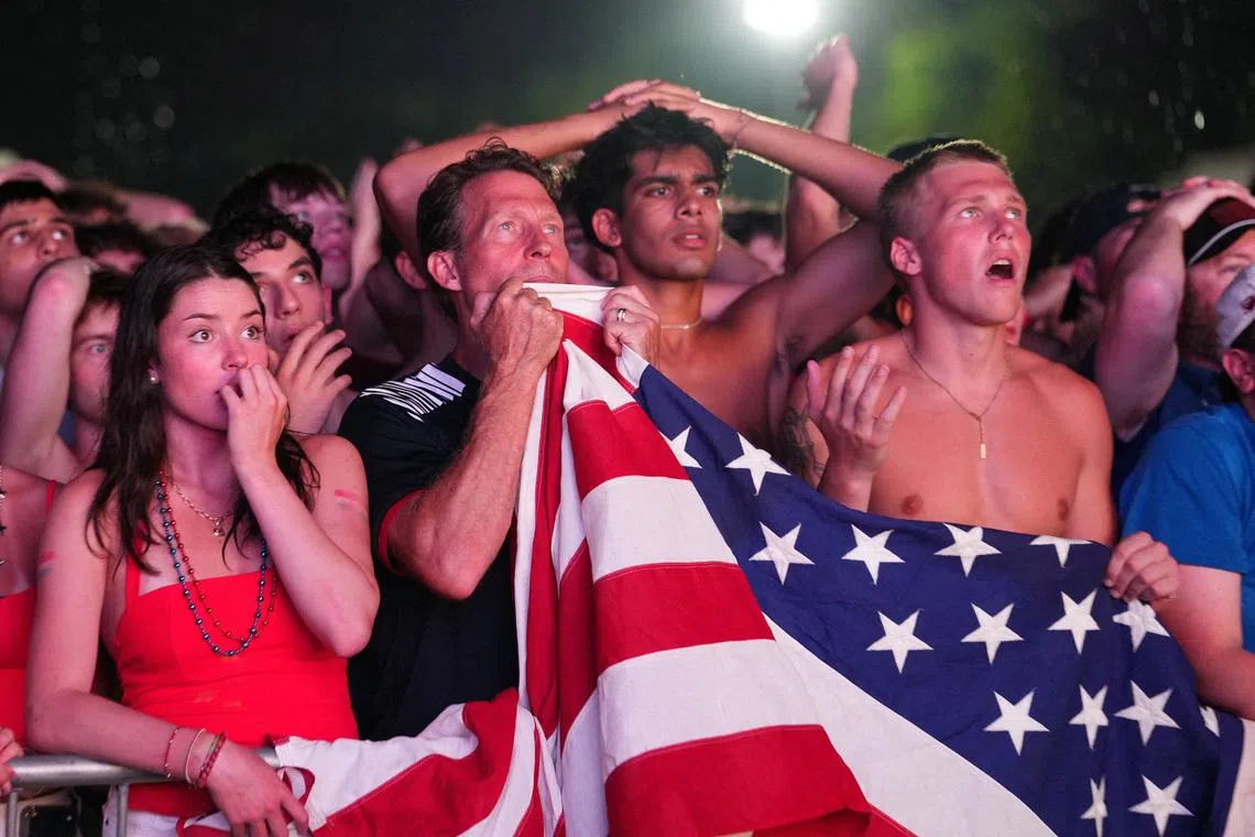 Soccer Football - FIFA World Cup 2026 - Round of 16 - United States v Belgium - Fans gather in Washington, D.C. - Washington, D.C., U.S. - July 6, 2026 U.S. fans react as they watch the match on a big screen at the National Mall REUTERS/Eric Lee