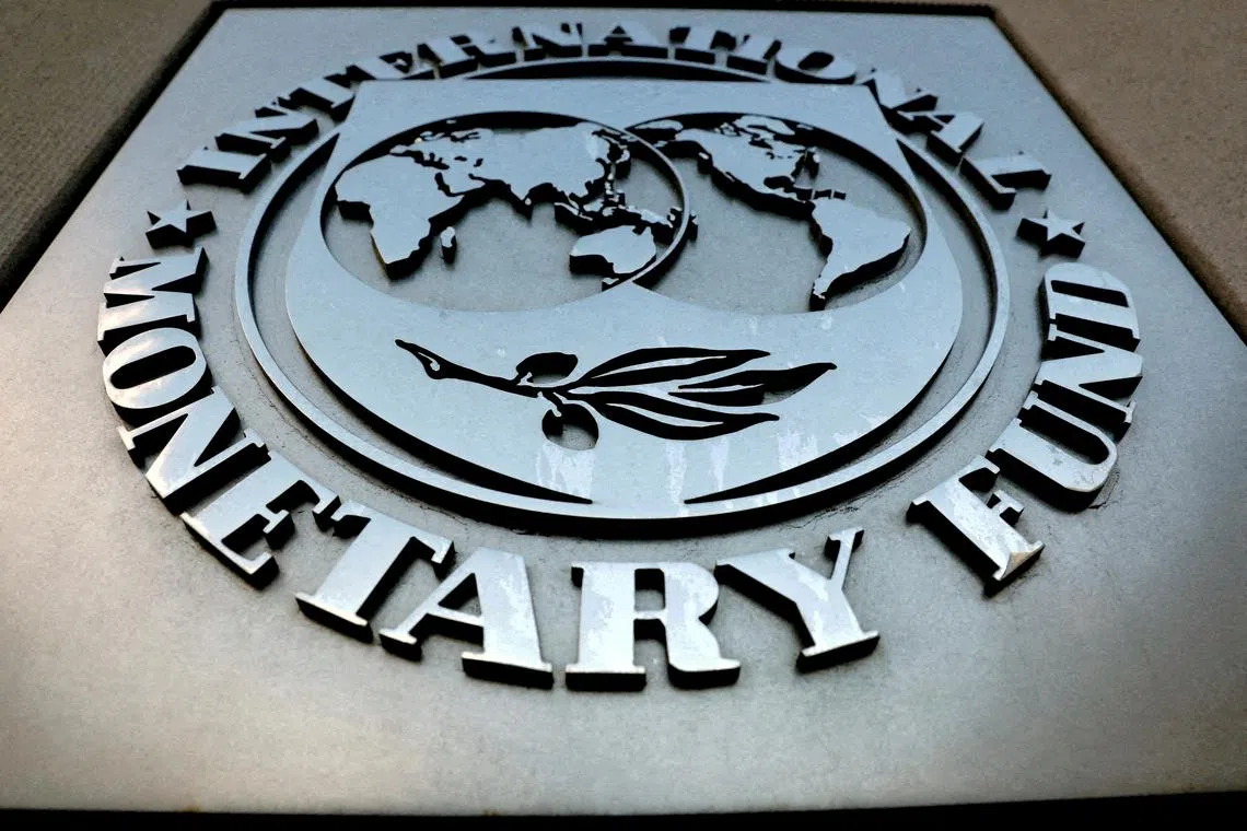 FILE PHOTO: The International Monetary Fund (IMF) logo is seen outside the headquarters building in Washington, U.S., September 4, 2018. REUTERS/Yuri Gripas/File Photo