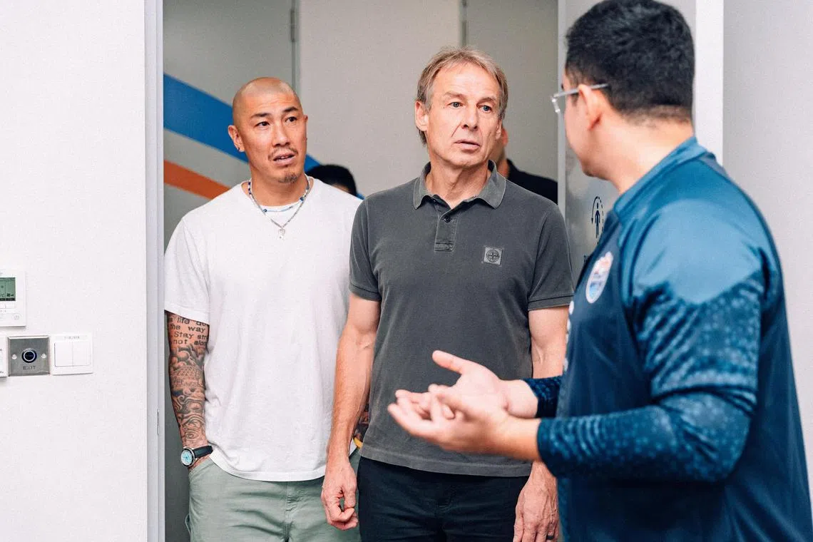 Jurgen Klinsmann (middle) and his South Korea assistant coach Cha Du-ri visited the Lion City Sailors' training ground on Wednesday. 

