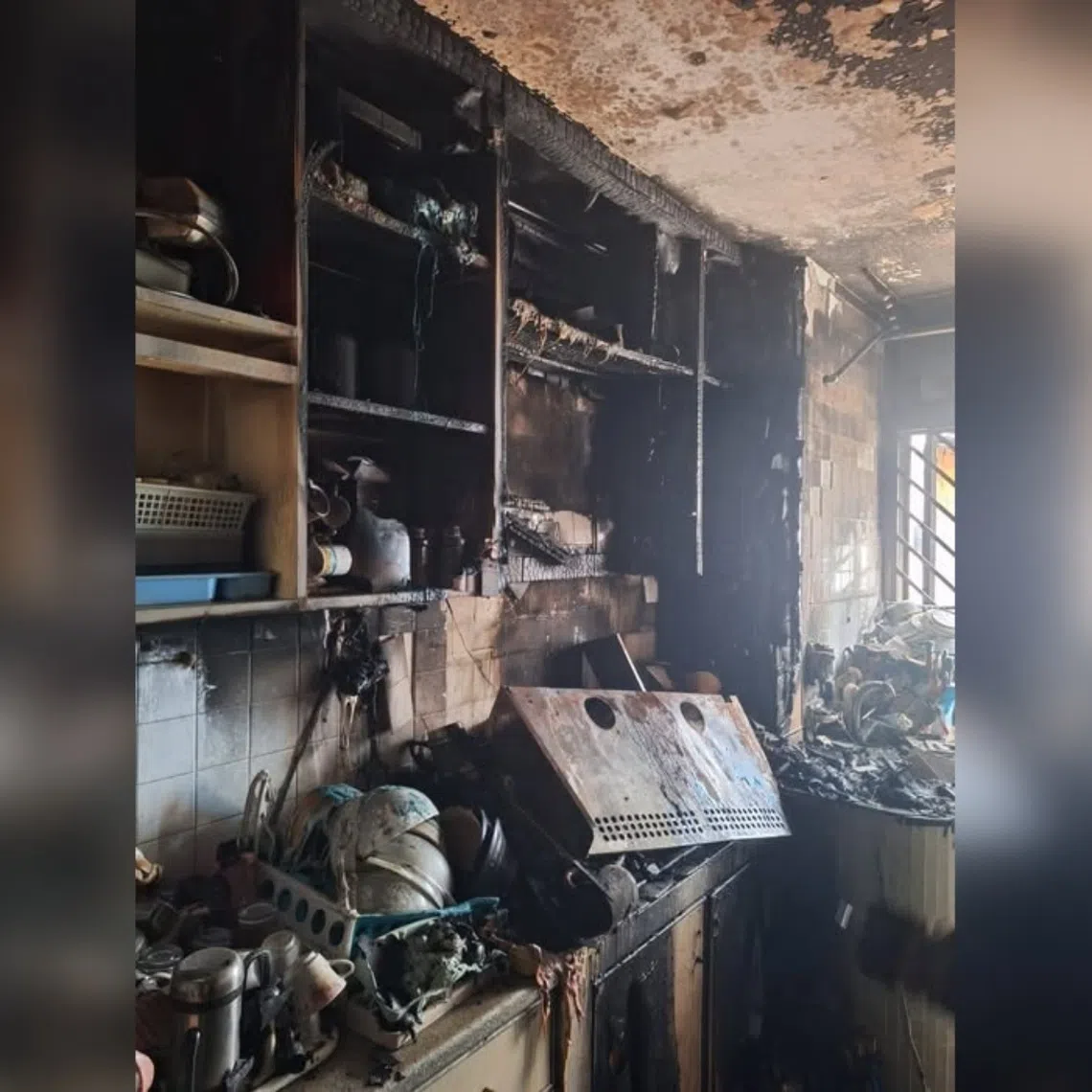 The fire affected the second-floor unit's kitchen and was extinguished by the SCDF with a water jet.