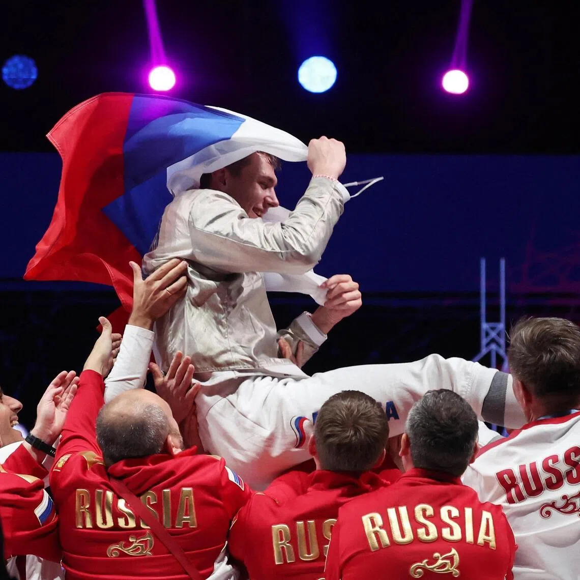 Russia’s Pavel Graudyn celebrates with teammates after winning the senior men’s sabre final match against South Korea’s Do Gyeong-dong at the World Fencing Championships in Hong Kong on July 28.