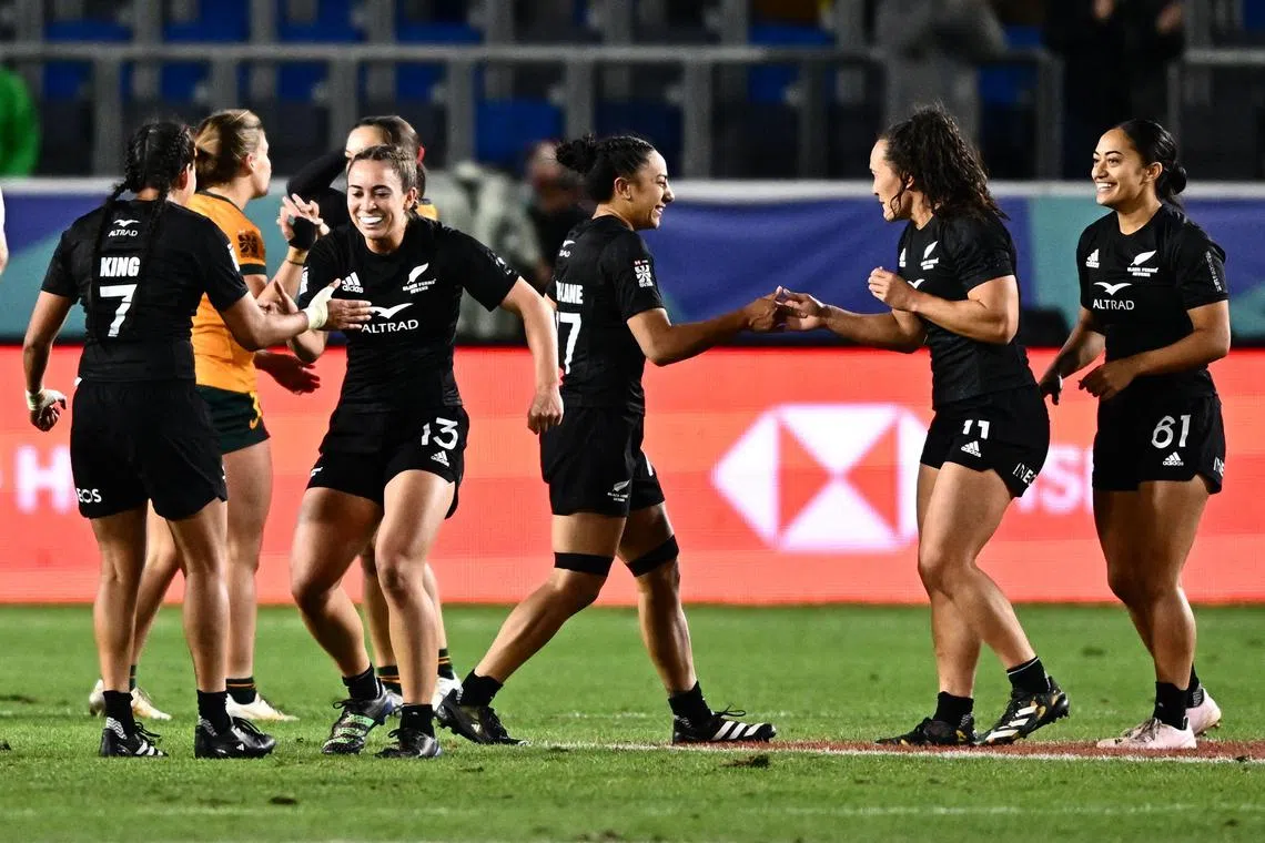 New Zealand's players celebrate during the 2024 HSBC Rugby Sevens Los Angeles tournament final women's match between New Zealand and Australia.