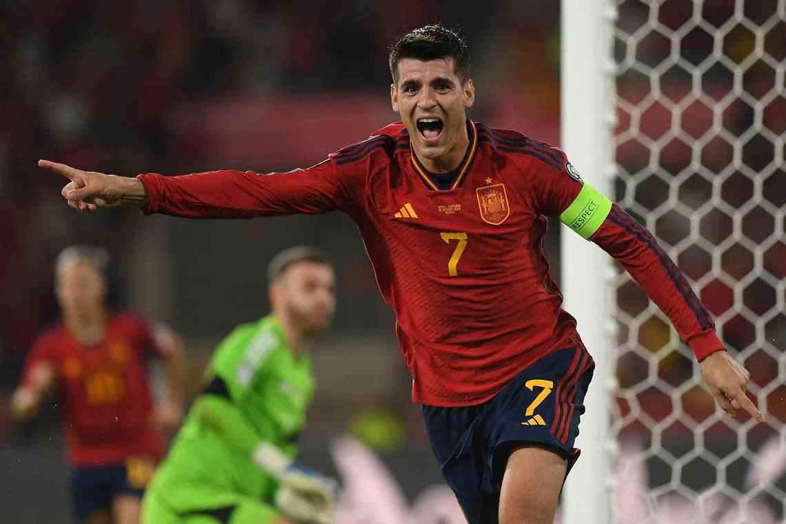 Spain's Alvaro Morata celebrates scoring his team's first goal.
