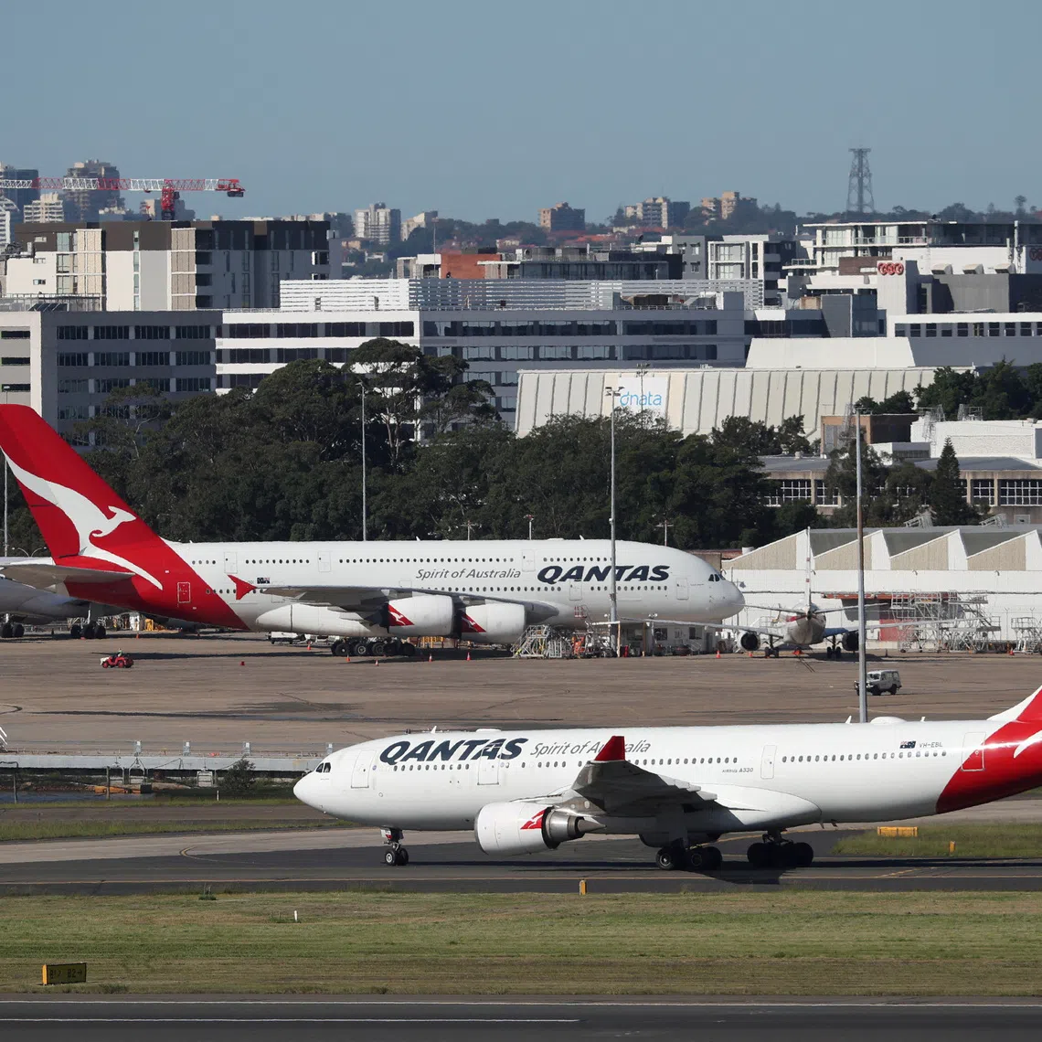 Hundreds of ground workers who handle freight and QantasLink regional flights will strike over pay and working conditions.